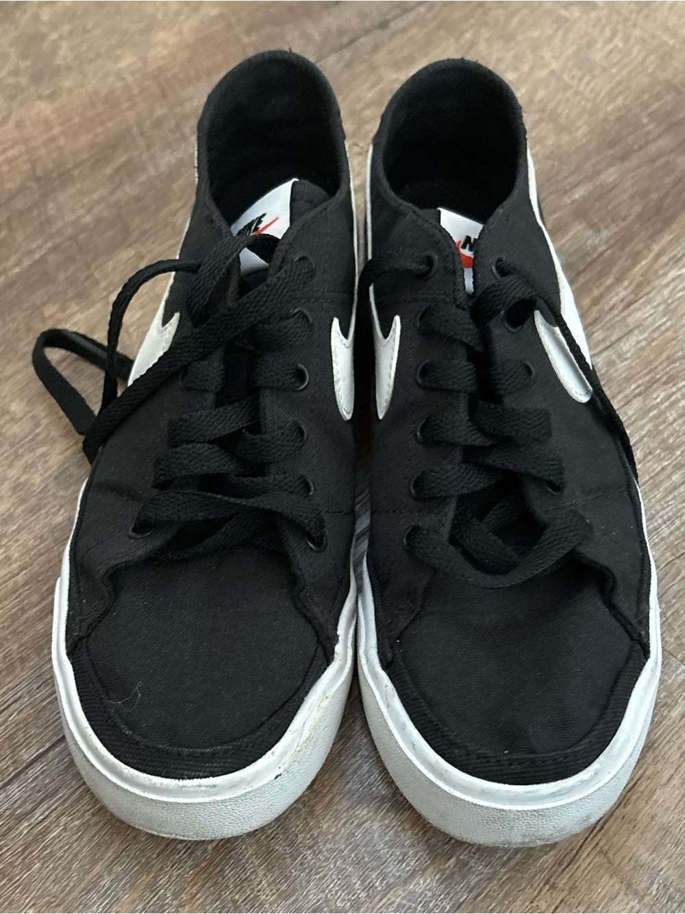 Nike Black Canvas Low-Top Sneakers with White Swoosh